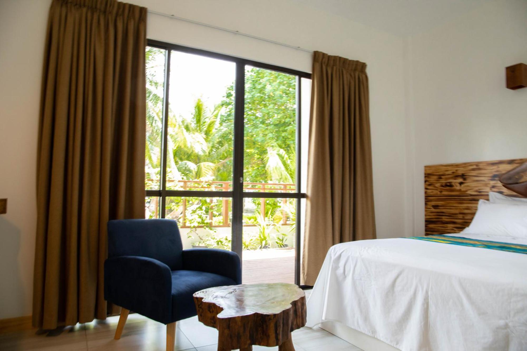 Kudhi Boli Beach House Thulusdhoo Rum bild