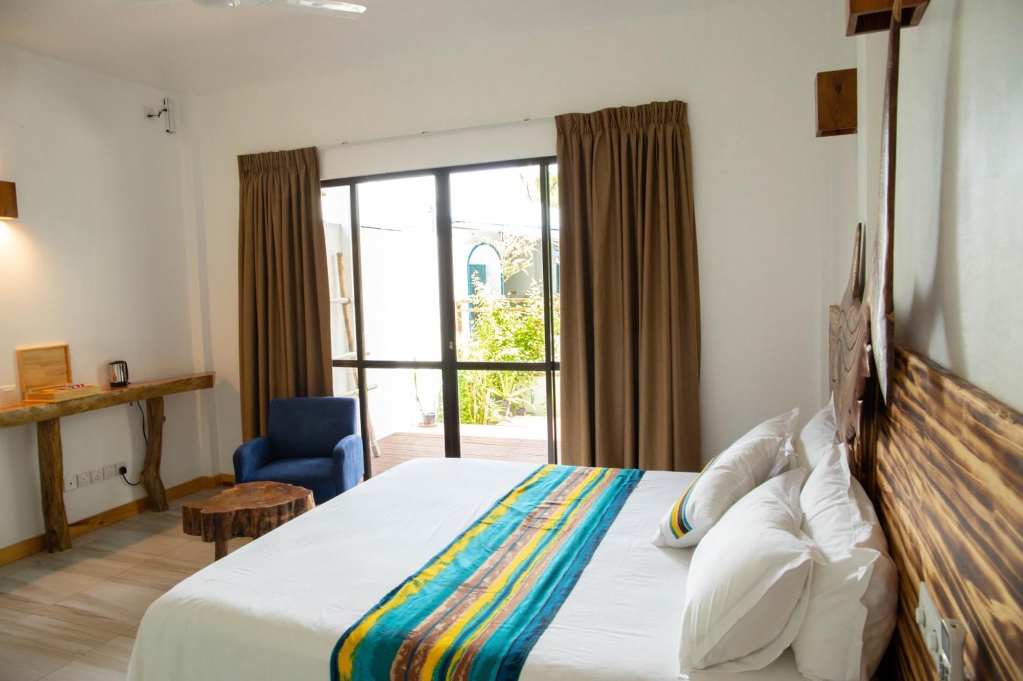 Kudhi Boli Beach House Thulusdhoo Rum bild